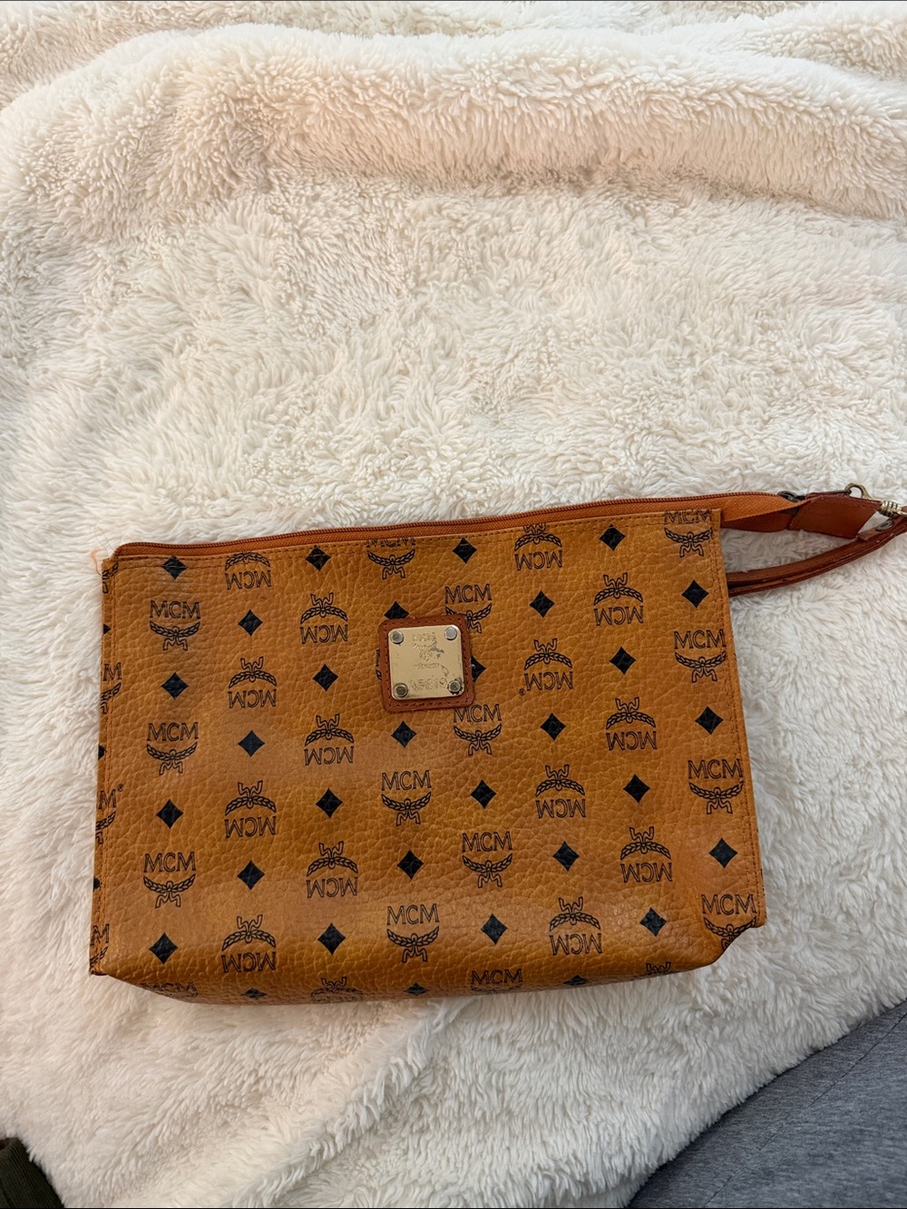 MCM Cognac Logo Zip Wristlet with Gold Plaque